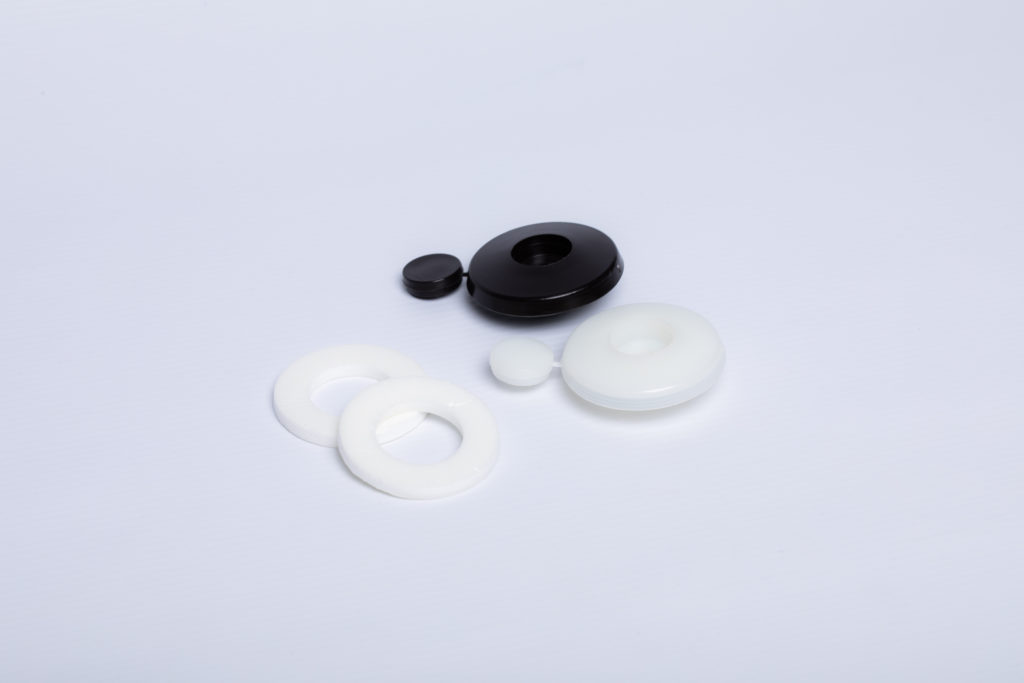 Białe i czarne podkładki grzybkowe do płyt o grubości 10 mm